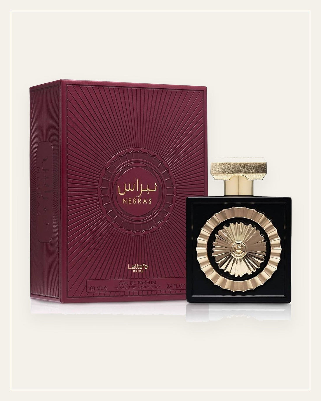 Frasco y estuche de Lattafa Nebras Eau de Parfum sobre fondo arena