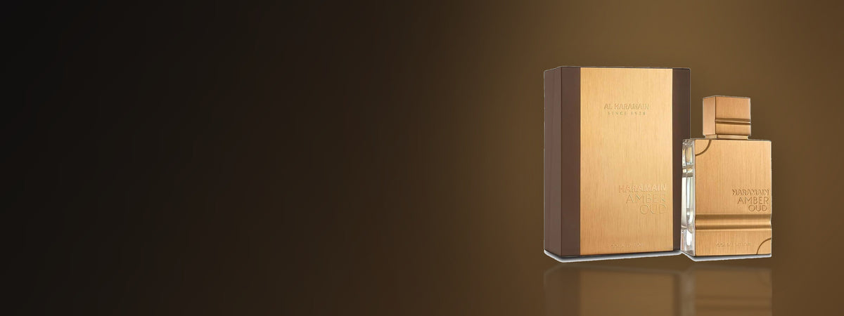 Al Haramain Amber Oud Gold Edition sobre fondo cálido, imagen principal de JORMOUSS